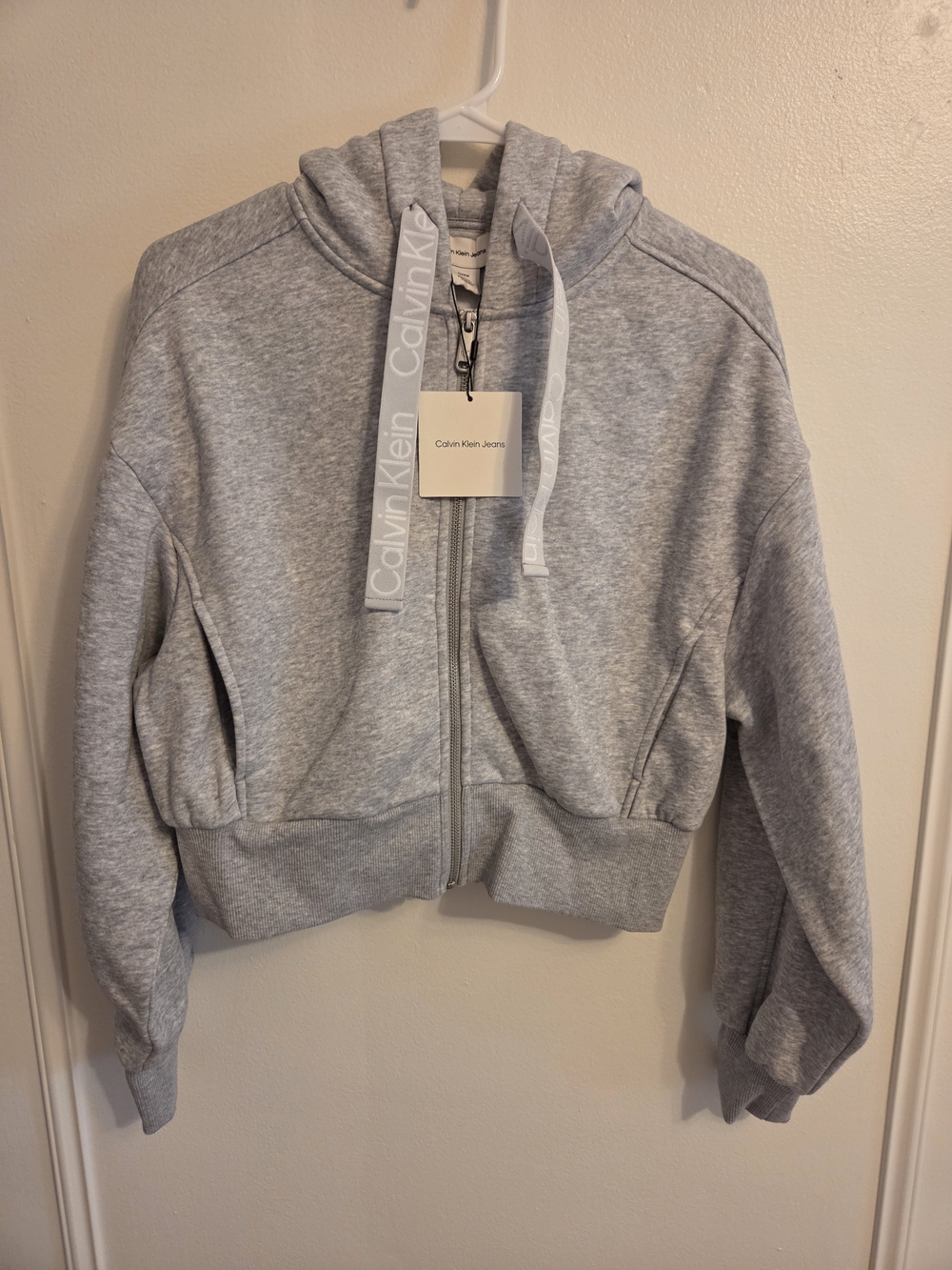 Light grey Calvin Klein zip-up cropped hoodie featuring wide logo-tape NWT